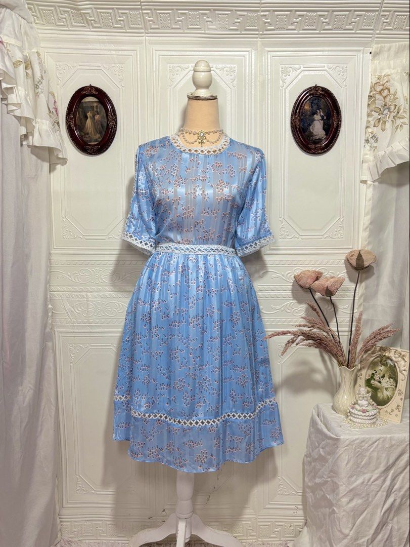 Sky Blue Glossy Printed Midi Dress (Category: Dresses) located in San Jose. Submitted by vintagely_retro (Listing ID 1470686121, Image 1). Description: Skirt has lining | sidezip Measurements: Frame Medium-Large Bust 38” Waist 32” Length 38” .