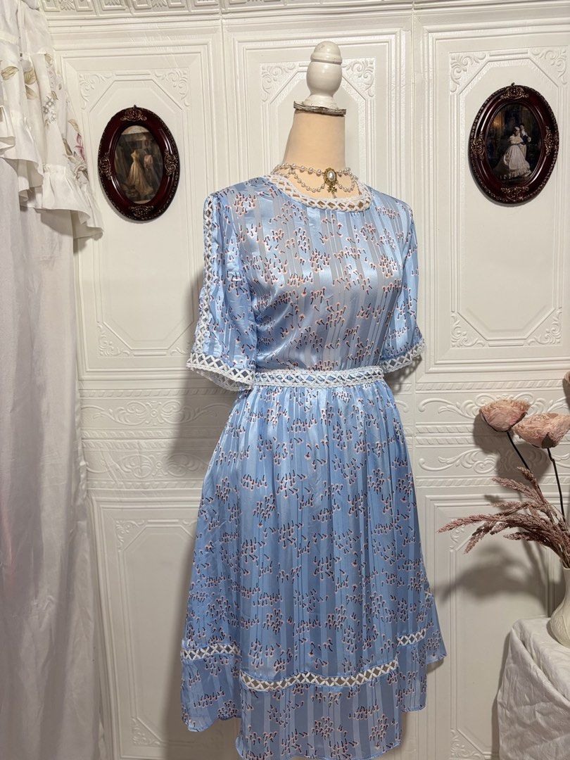 Sky Blue Glossy Printed Midi Dress (Category: Dresses) located in San Jose. Submitted by vintagely_retro (Listing ID 1470686121, Image 3). Description: Skirt has lining | sidezip Measurements: Frame Medium-Large Bust 38” Waist 32” Length 38” .
