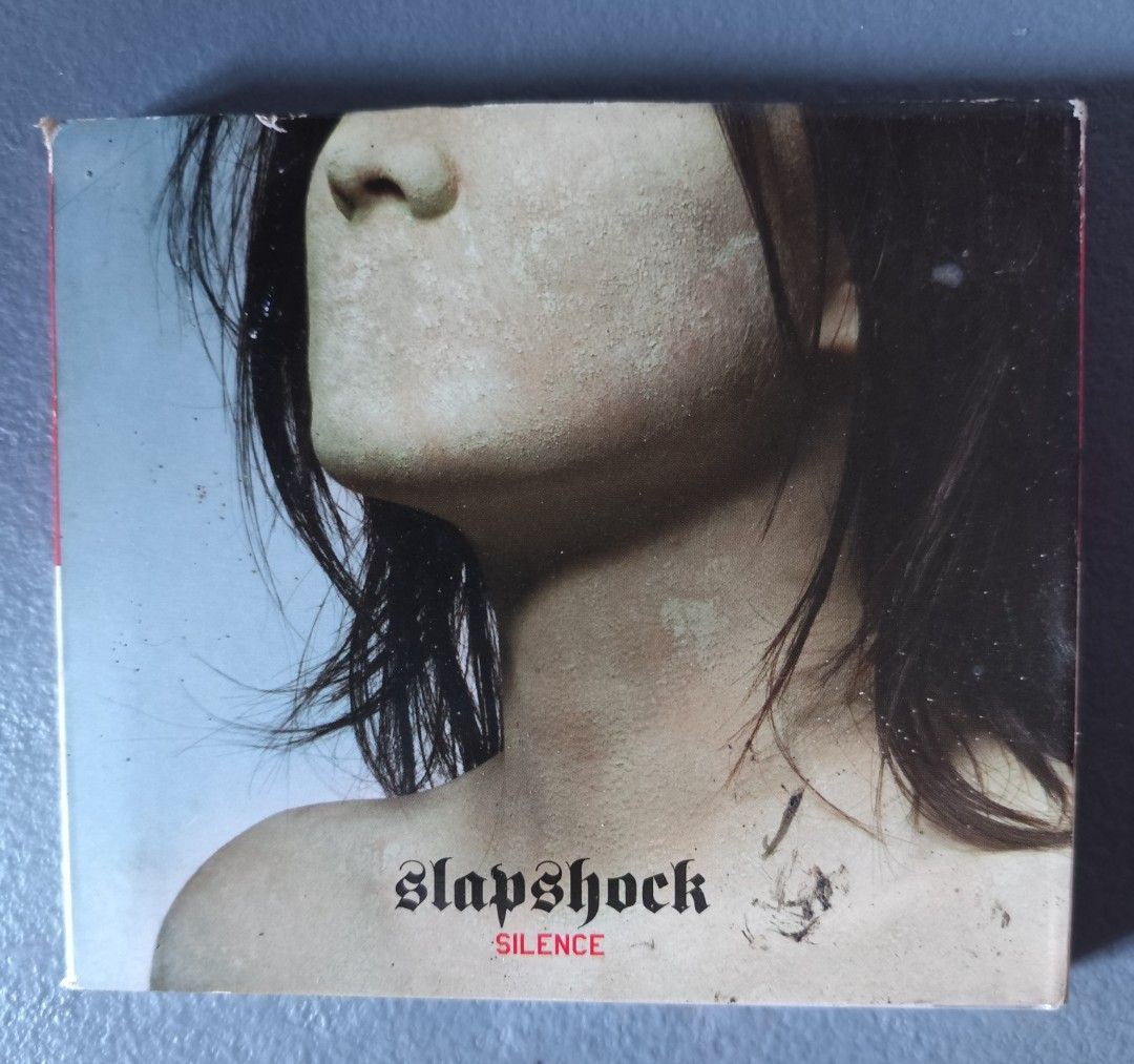 Slapshock Silence CD Album (Category: CDs & DVDs) located in Valenzuela. Submitted by xjepsx (Listing ID 1470630673, Image 1). Description: - Artist & Album: Slapshock - Silence - Format: CD in jewel case - Condition: Disc plays normally, case has minor surface wear and edge scuffs - Gen: Rare local Pinoy metal / alternative rock release - Inclusions: Original art cover intact.