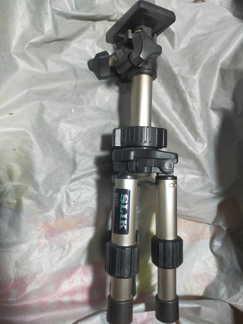 SLIK Mini Tripod - (Japan) (Category: Tripods & Monopods) located in Pasay City. Submitted by 22aileen (Listing ID 1470722127, Image 3). Description: SLIK Mini Tripod - (Japan) > Tabletop, matibay, pang cam/phone > Working lock, Good condition.