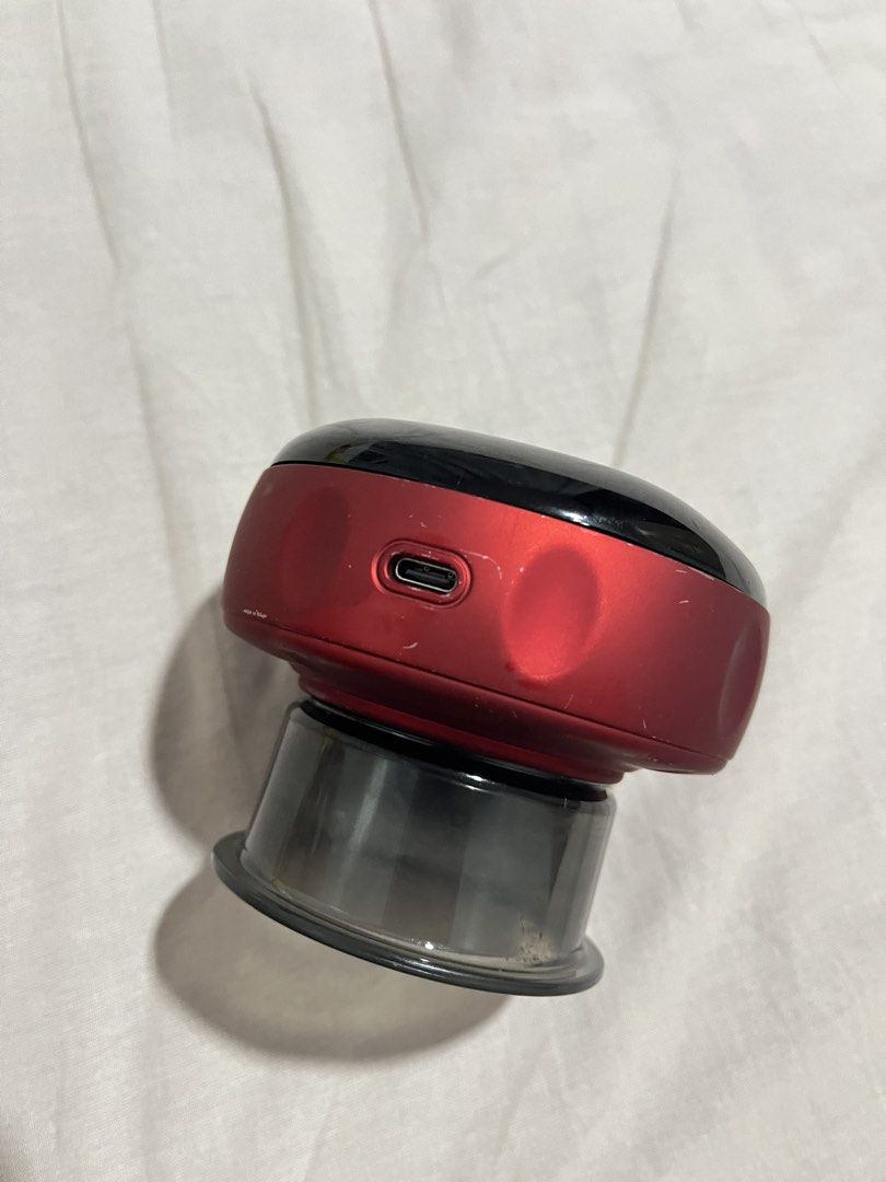 Smart Cupping Therapy Massager Red USB-C (Category: Massage Devices) located in Manila. Submitted by curated.clutter12 (Listing ID 1470608318, Image 1). Description: - Color: Red with a black top panel - Features: Adjustable power, heat, and suction levels with control buttons on top - Charging: USB-C port on the side (charges and works perfectly) - Design: Clear suction cup base featuring an internal massage head - Condition: Minor cosmetic wear