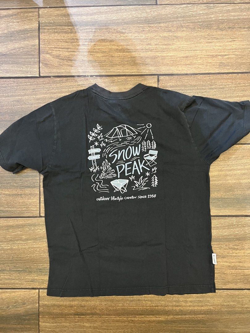 Snow Peak Graphic T-Shirt (Category: Tshirts & Polo Shirts ) located in Mandaluyong City. Submitted by johngil101 (Listing ID 1470660973, Image 2). Description: - Brand: Snow Peak - Color: Dark Grey - Size: L 22x25.