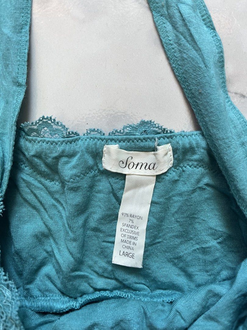 Soma Teal Lace Trim Cami Top (Category: Sleeveless) located in Caloocan City. Submitted by kimronnel (Listing ID 1470578477, Image 3). Description: - Brand: Soma - Size: Large - Color: Teal - Material: 93% Rayon, 7% Spandex - Features: Delicate lace trim on neckline and hem, front ruching with a cute decorative bow, and adjustable straps - Perfect for layering or as a cozy sleepwear piece.
