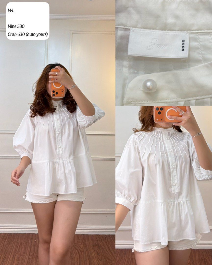 SONO White Pleated Top (Category: Blouses) located in Manila. Submitted by angelll0123 (Listing ID 1470699491, Image 1). Description: - Brand/Model: SONO white blouse - Size: M-L - Details: Pleated neckline and front button placket - Buttons: Chic pearl-style buttons - Sleeves: Relaxed puff sleeves with gathered cuffs - Hem: Tiered peplum hem for a flowy shape - Fabric: Lightweight and versatile, perfect with shorts or trousers.