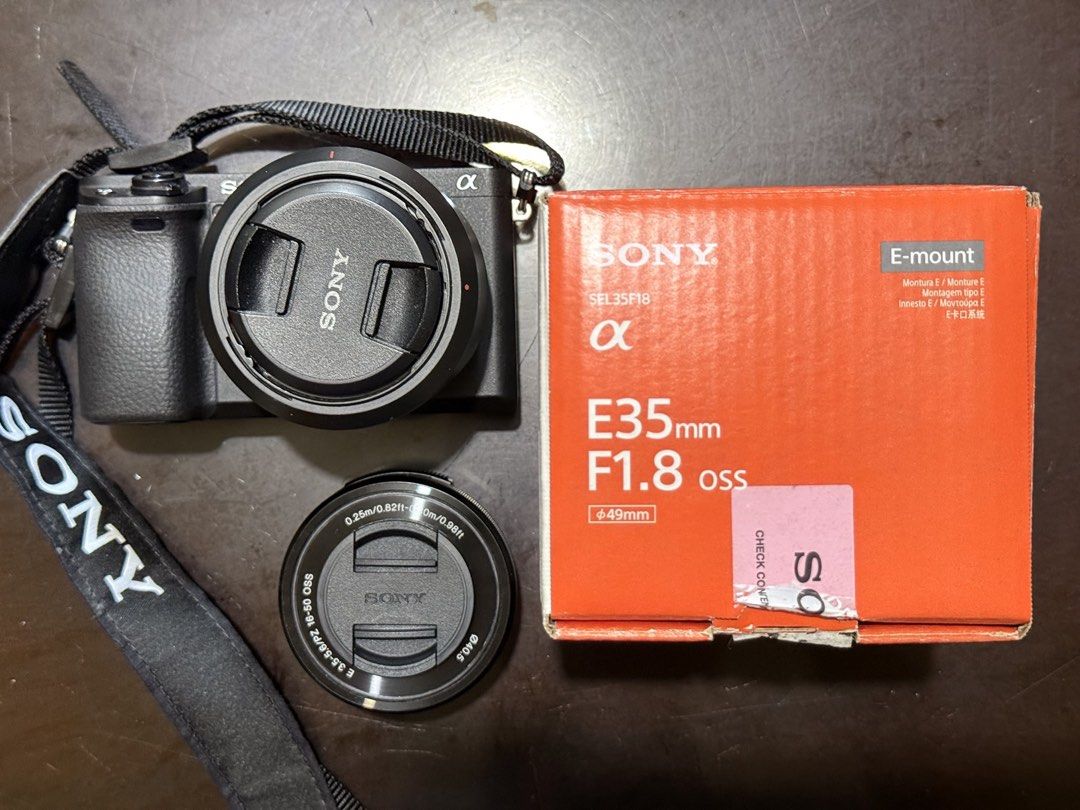SONY A6400 w/ 35mm SONY LENS (Category: Cameras) located in Quezon City. Submitted by fliabrnvo (Listing ID 1470610075, Image 1). Description: Aesthetic wise - Like new Bought 35mm lens for 20k - Rarely used Sony A6400 - Body - ~4,000 shutter count - 16-50mm kit lens - Box - Sony E 35mm F1.8 OSS lens (w/ box) - April 2025 acquired - 1x Original Sony battery - Spare K&F batteries - K&F battery hub - Minor issue: dead pixel on LCD (white dot beside