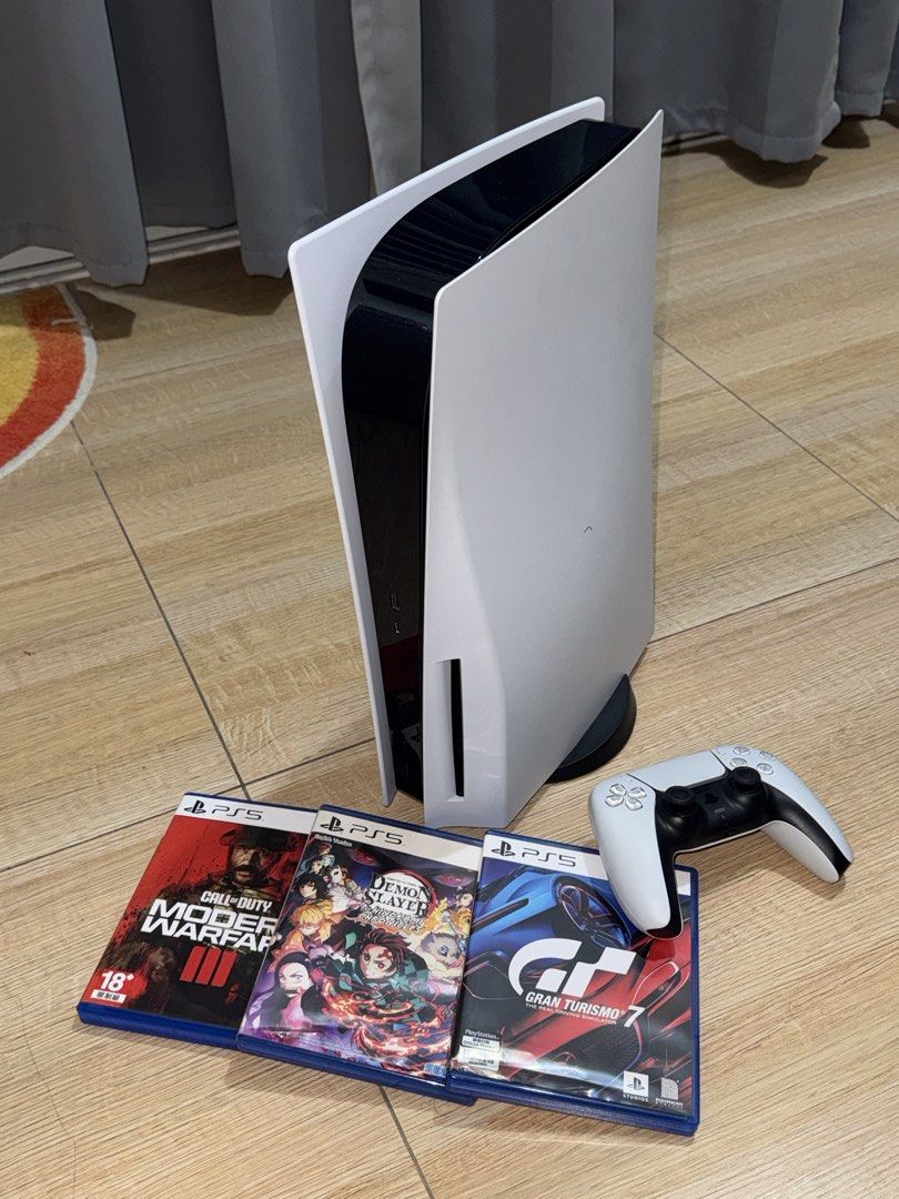 Sony PlayStation 5 Console with Controller and Three Games (Category: PlayStation) located in Pateros City. Submitted by moty0840 (Listing ID 1470630585, Image 1). Description: - Ps5 Phat - firmware 14.xx - 1 controller ( stick drift) - 3 games included - gran turismo 7 - demon slayer - call of duty modern warfare 3 - no box - with hdmi and power cable - 825gb - pasig loc.