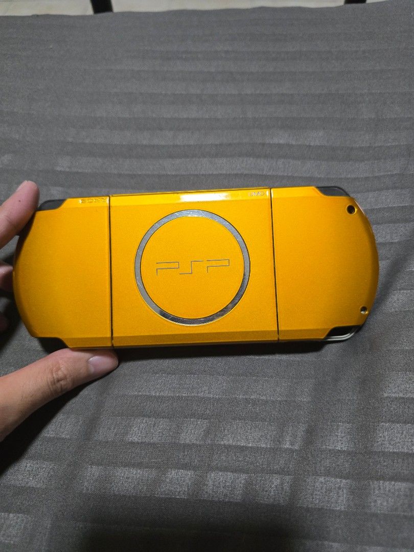 Sony PSP 3000 Carnival Yellow (Category: PlayStation) located in Makati City. Submitted by dannybeware (Listing ID 1470607923, Image 3). Description: - Rare Carnival Yellow PSP 3000 in great working condition - CFW with 32 gb SD card - Includes a clear protective plastic shell and charger RFS: Don't use it anymore.