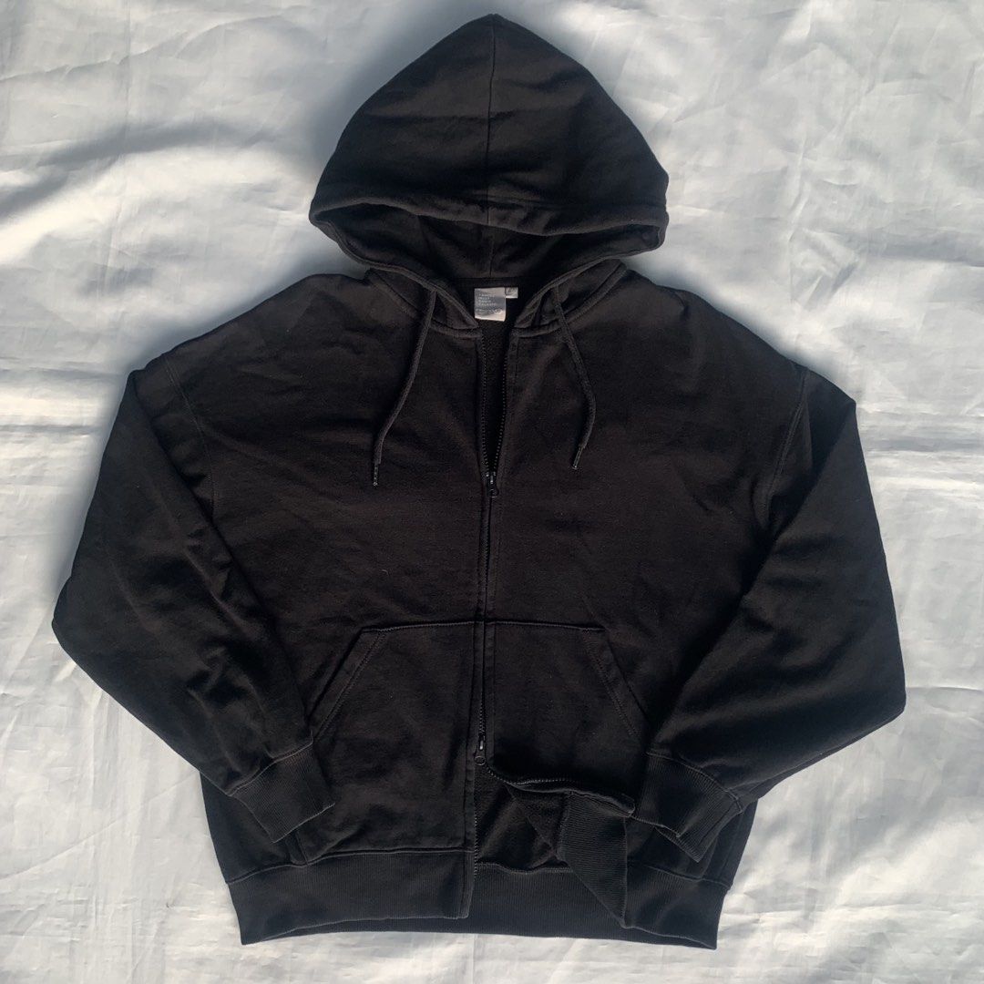 SPAO Black Zip Up Hoodie (Category: Coats, Jackets and Outerwear) located in Zamboanga. Submitted by dherick38 (Listing ID 1470669612, Image 2). Description: - Brand: SPAO - Color: Classic Black - Material: Heavyweight cotton fleece for ultimate warmth and comfort - Fit: Oversized and relaxed streetwear style - Details: Two-way zipper at the hem, front pouch pocket, and adjustable hood drawstrings - Condition: Excellent/Ready to wear.