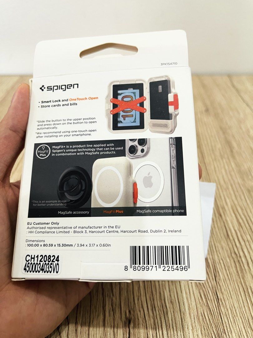 Spigen Magsafe Card Holder and wallet (Category: Cases & Sleeves) located in Quezon City. Submitted by ccgem (Listing ID 1470639685, Image 2). Description: Spigen Magfit + Card Holder TinTap wallet Color: Dune Beige Bought at ₱2900, selling very low Good as new Very very strong magnetic attachment Has integrated magsafe on top for popsockets Can hold up to 6 cards plus bills Built-in lock feature Non-staining, keeps its clean looking color RFS: b