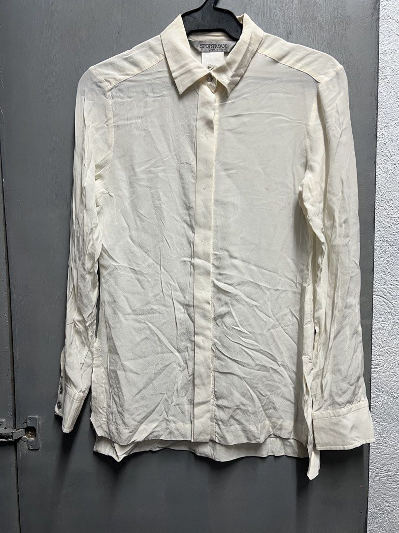 SPORTMAX (Category: Longsleeves) located in Dasmarinas. Submitted by jessputrages (Listing ID 1470720490, Image 1). Description: For sale Sportmax Excellent condition No issue 800 plus shipping fee Pm for more details.