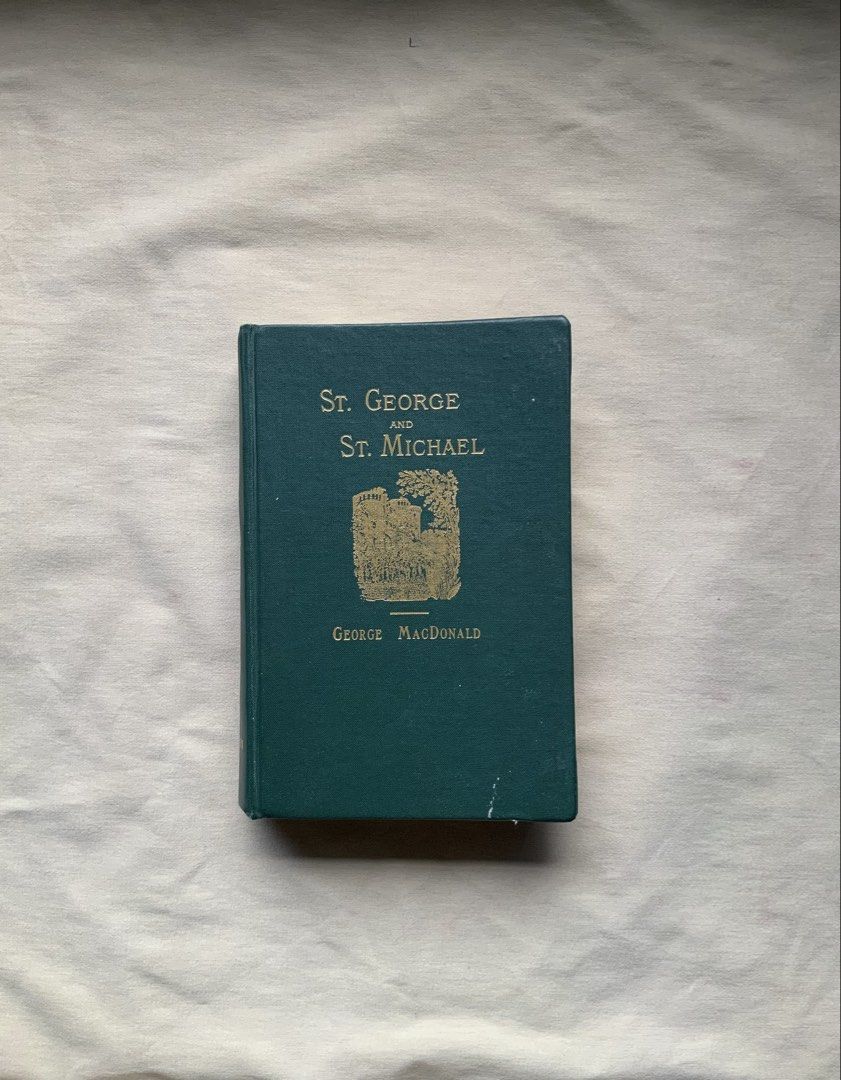St. George and St. Michael by George MacDonald (Category: Storybooks) located in Manila. Submitted by benjchpages (Listing ID 1470640096, Image 1). Description: - Title: St. George and St. Michael by George MacDonald - Format: Hardcover copy - Exterior: Dark green cloth binding with elegant gold embossed lettering and castle illustration on the front cover - Interior: Classic layout featuring Roman numerals for chapter numbers and regular numbers