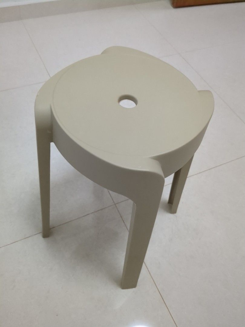 Stackable plastic stools beige set (Category: Chairs) located in Singapore. Submitted by primenumber (Listing ID 1470603170, Image 2). Description: - Set of sturdy beige plastic stools - Space-saving stackable design - Round seats feature a central hole for easy lifting and carrying - Clean overall condition - Ideal for extra seating in the kitchen, balcony, or living room - Sold together as a bundle.