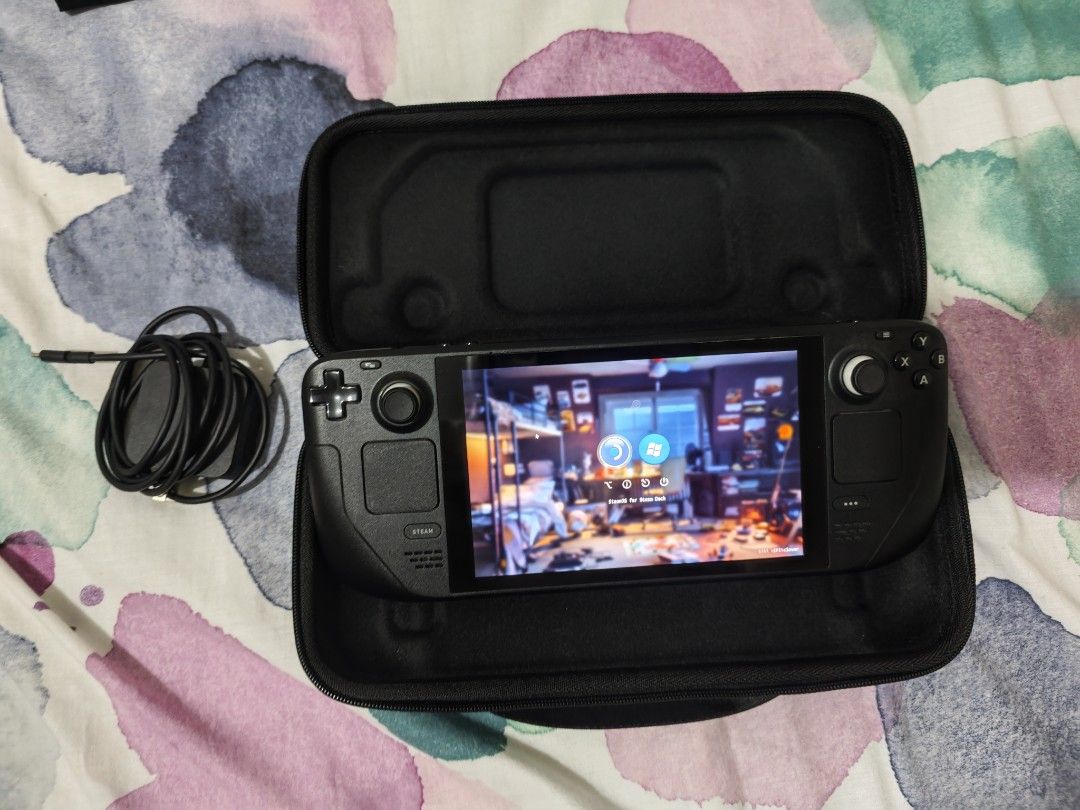 Steam Deck LCD 1TB (Category: Others) located in Manila. Submitted by royalcat_84291b (Listing ID 1470627697, Image 2). Description: Selling a Steam Deck LCD 1TB laptop in excellent condition. Ideal for portable gaming and mobile PC gaming. Item Details * 1TB SSD storage * Smoothly runs games and indie titles * Supports Steam OS and Windows 11 * Portable handheld gaming PC Health Status * On-screen controller works well Includes an expansion box 