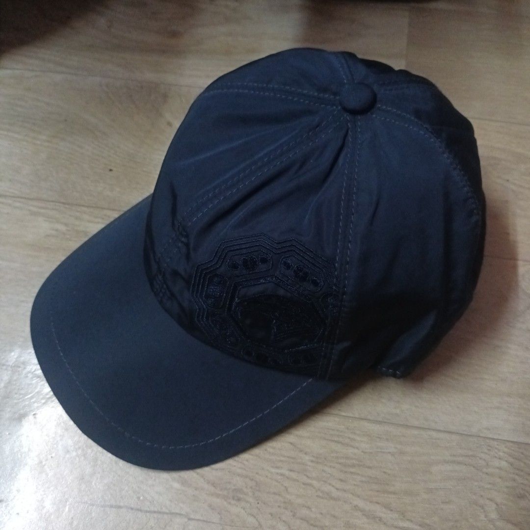 Stefano Ricci Navy Blue Cap (Category: Caps & Hats) located in Manila. Submitted by itsnik444 (Listing ID 1470634444, Image 3). Description: - Brand: Stefano Ricci - Color: Dark blue - Design: Detailed eagle embroidery on the side panel - Interior: Grey jersey lining with an orange ribbed sweatband - Fit: Elasticated back section - Condition: Clean inside and out, made with premium quality materials.