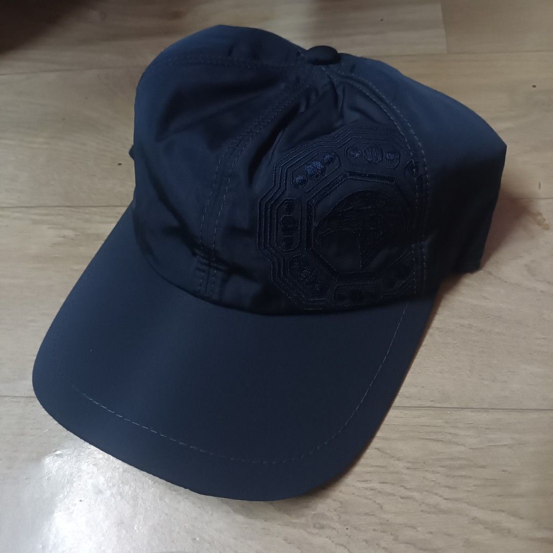 Stefano Ricci Navy Blue Cap (Category: Caps & Hats) located in Manila. Submitted by itsnik444 (Listing ID 1470634444, Image 1). Description: - Brand: Stefano Ricci - Color: Dark blue - Design: Detailed eagle embroidery on the side panel - Interior: Grey jersey lining with an orange ribbed sweatband - Fit: Elasticated back section - Condition: Clean inside and out, made with premium quality materials.