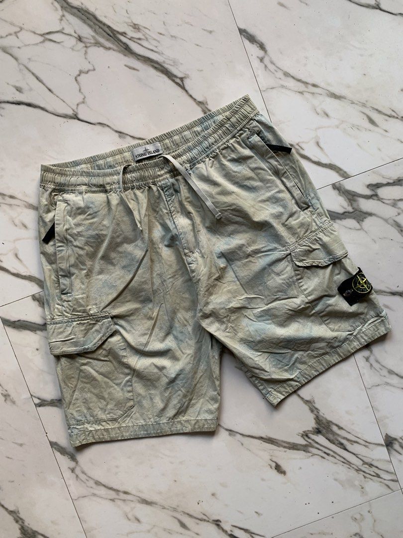 STONE ISLAND UTILITY-CARGO LIGHT CAMO SHORTS (Category: Shorts) located in Dagupan City. Submitted by re.worth.dgpn.ph (Listing ID 1470700817, Image 2). Description: - Authentic Stone Island cargo shorts - Trendy acid wash finish - Elastic waistband with adjustable drawstring - Secure zippered side pockets - Practical snap-flap cargo pockets and single back pocket - Verified authentic with internal Certilogo tag.
