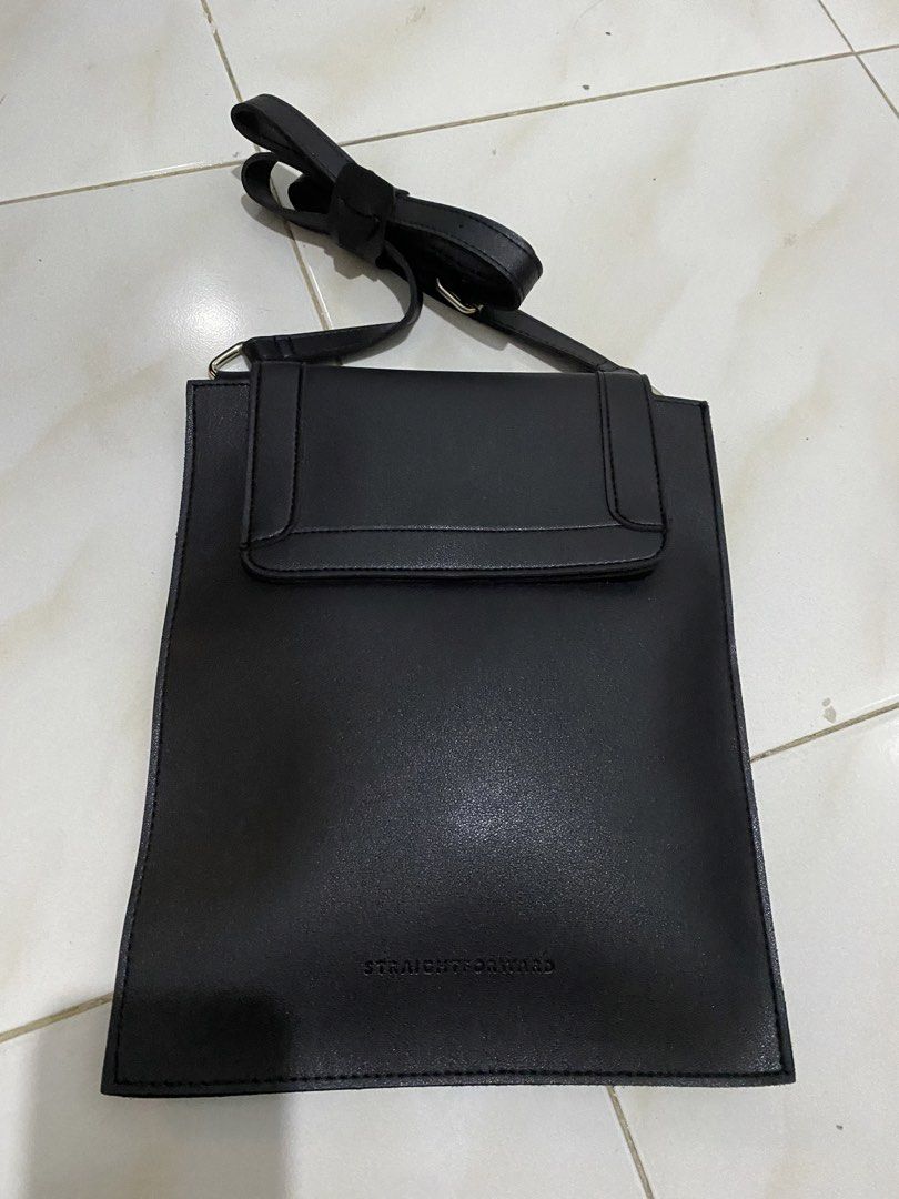 Straightforward DVL Furrato Black Bag (Category: Cross-body Bags) located in Taguig. Submitted by maaarrrrrcky (Listing ID 1470594798, Image 2). Description: - Brand: DVL (Boundless Basics tag attached) - Model: Furrato - Color: Black - Condition: Brand new with original tag - Features: Adjustable strap, magnetic snap closure, and embossed front logo - Design: Minimalist and versatile.