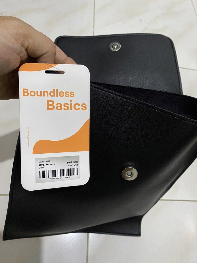 Straightforward DVL Furrato Black Bag (Category: Cross-body Bags) located in Taguig. Submitted by maaarrrrrcky (Listing ID 1470594798, Image 1). Description: - Brand: DVL (Boundless Basics tag attached) - Model: Furrato - Color: Black - Condition: Brand new with original tag - Features: Adjustable strap, magnetic snap closure, and embossed front logo - Design: Minimalist and versatile.