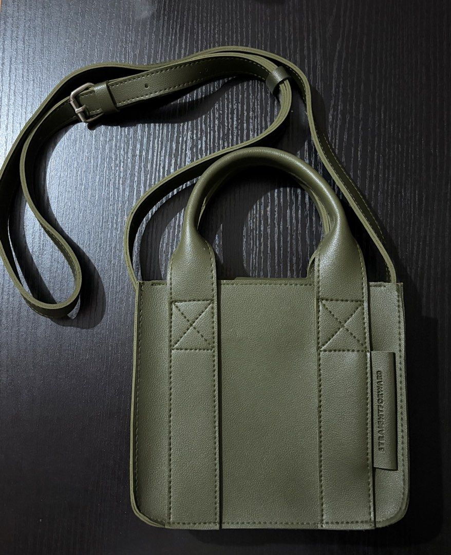 Straightforward Small Bag (Category: Cross-body Bags) located in Cainta. Submitted by vlera (Listing ID 1470684490, Image 3). Description: - Olive/Dark Green Color - Straightforward Brand - Adjustable Crossbody Bag Measurements of the bag are in the pictures. .