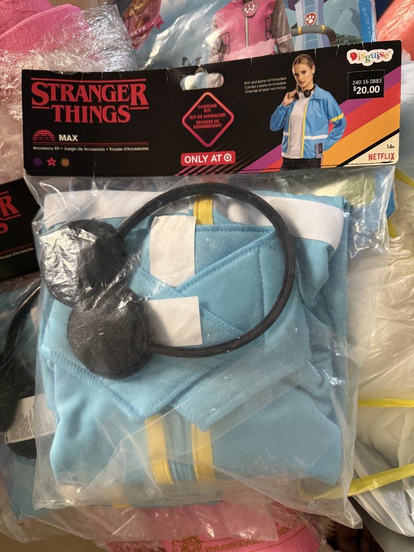 Stranger Things Max Costume Kit (Category: Coats, Jackets and Outerwear) located in Muntinlupa City. Submitted by lemonbearph (Listing ID 1470570651, Image 1). Description: Stranger Things Max costume kit from Disguise. Blue and yellow zip-up jacket with white stripes. Includes faux headphones accessory. Plus size XL, fits chest 33 inches, waist 29 inches, hips 34.5 inches. Target exclusive item. Original packaging included..