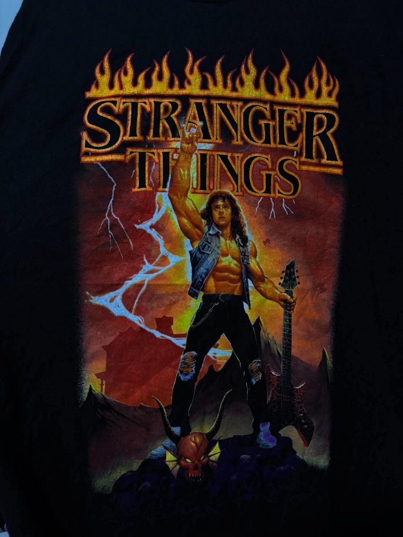 Stranger Things Shirt (Category: Tshirts & Polo Shirts ) located in Bauan. Submitted by onetwothrift2 (Listing ID 1470665857, Image 3). Description: Stranger Things Shirt Size: Large Dimes: L30.5 W22 Color rate: 10/10 As new condition No issue Mine: 700.