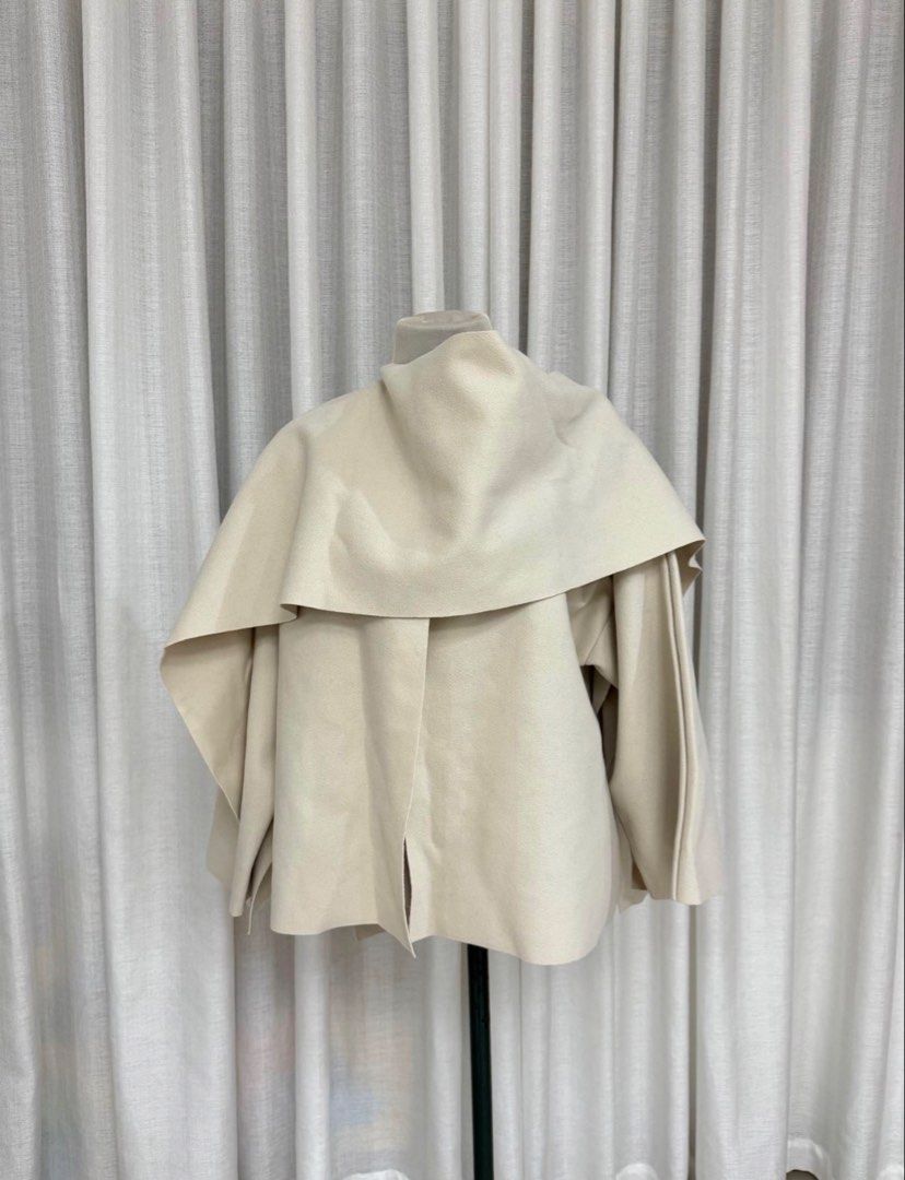 Stunning Cape Coat (Category: Coats, Jackets and Outerwear) located in Makati City. Submitted by bagsy01 (Listing ID 1470652657, Image 1). Description: Used only once! Purchased from another FB seller who originally bought it brand-new in Paris..