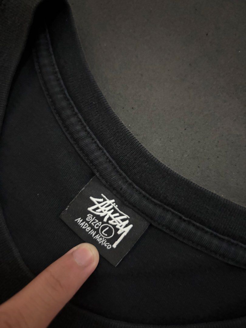 Stussy (Category: Tshirts & Polo Shirts ) located in Ibajay. Submitted by thriftthriftlang.aklan (Listing ID 1470649733, Image 3). Description: Stussy Dimes-22x27.5 Condition-Excellent Condition Color Rate-9/10 Issue-Minimal Fade in the Design.
