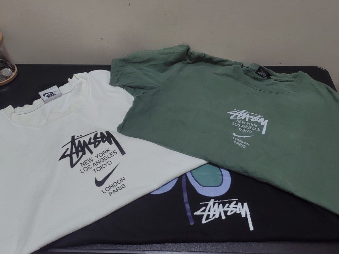 Stussy 3pcs bundle (Category: Tshirts & Polo Shirts ) located in Legazpi City. Submitted by livedolphin_68dee2 (Listing ID 1470598816, Image 1). Description: White size medium on tag (19x27) Green size medium on tag (18x24) Black size medium on tag (21x28).