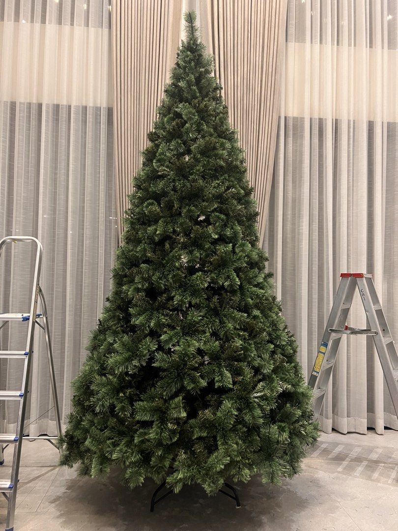 Sugar vinyl Christmas Tree (Category: Artificial Plants & Flowers) located in Manila. Submitted by jamesgani08 (Listing ID 1470569325, Image 1). Description: - Big and tall green artificial Christmas tree, perfect for high ceilings - Full branches featuring realistic pine needle tips - Sturdy metal stand included at the base - Complete holiday bundle: includes string lights and red & silver bauble ornaments - Easy to assemble and ready to bring f