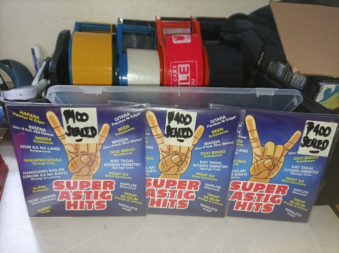 SUPER ASTIG HITS CD (Category: CDs & DVDs) located in Manila. Submitted by nw101 (Listing ID 1470598155, Image 2). Description: OPM CD SUPER ASTIG HITS Brand New Sealed NO RESERVATION (iwas joy miner/joy reserver) Manila - Pick up, rider pick up or JNT Provincial - JNT (everyday shipping) Like us & follow : Lahn's Vinyl Shop.
