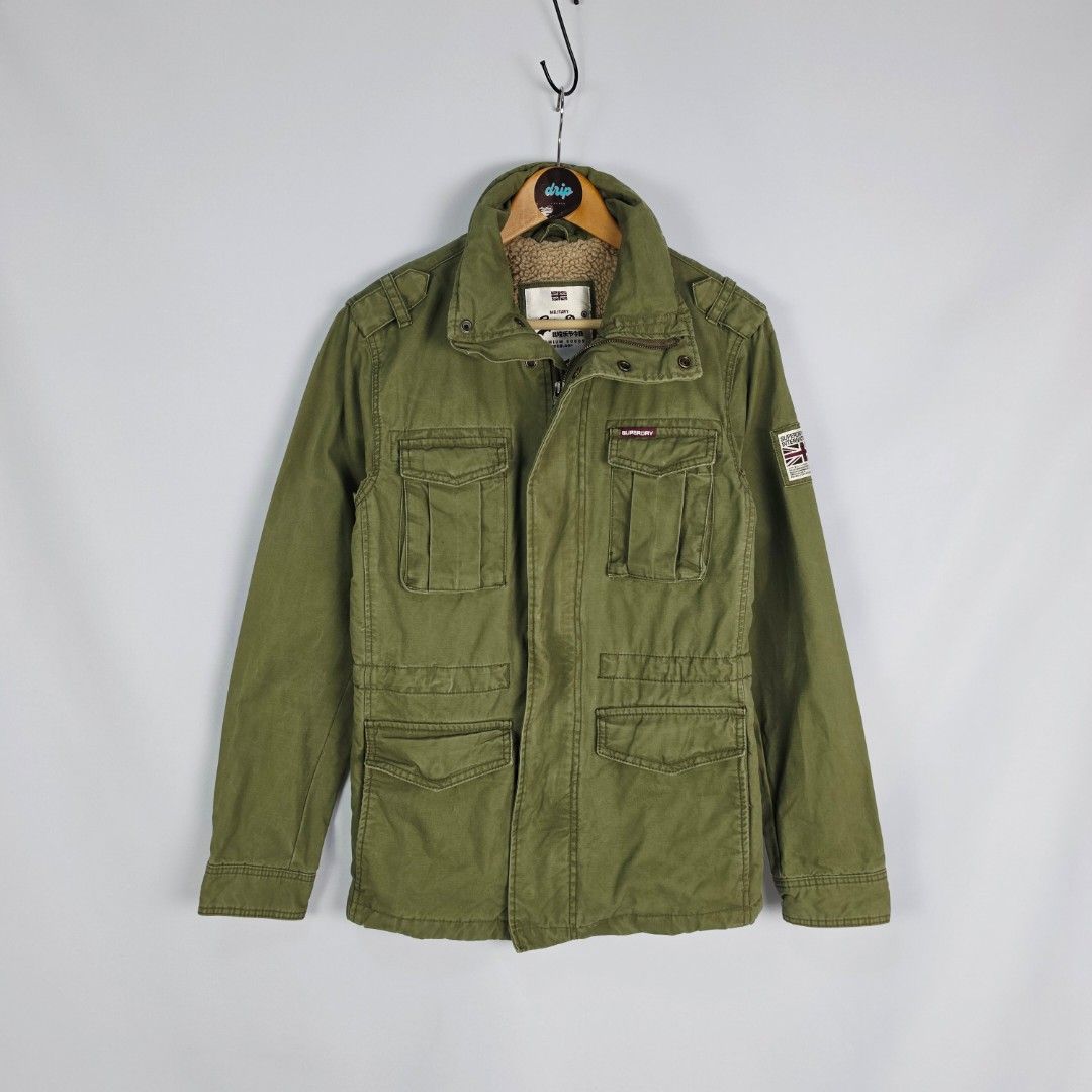 Superdry Army Green Field Jacket (Category: Coats, Jackets and Outerwear) located in Pasig City. Submitted by driplocale (Listing ID 1470681263, Image 1). Description: Superdry Army Green Field Jacket Condition 9.5/10 (Pristine Condition✨) Size: Small Chest Width: 19.5inches Shoulder Width: 17.5inches Length (Shoulder to Hem): 30inches.