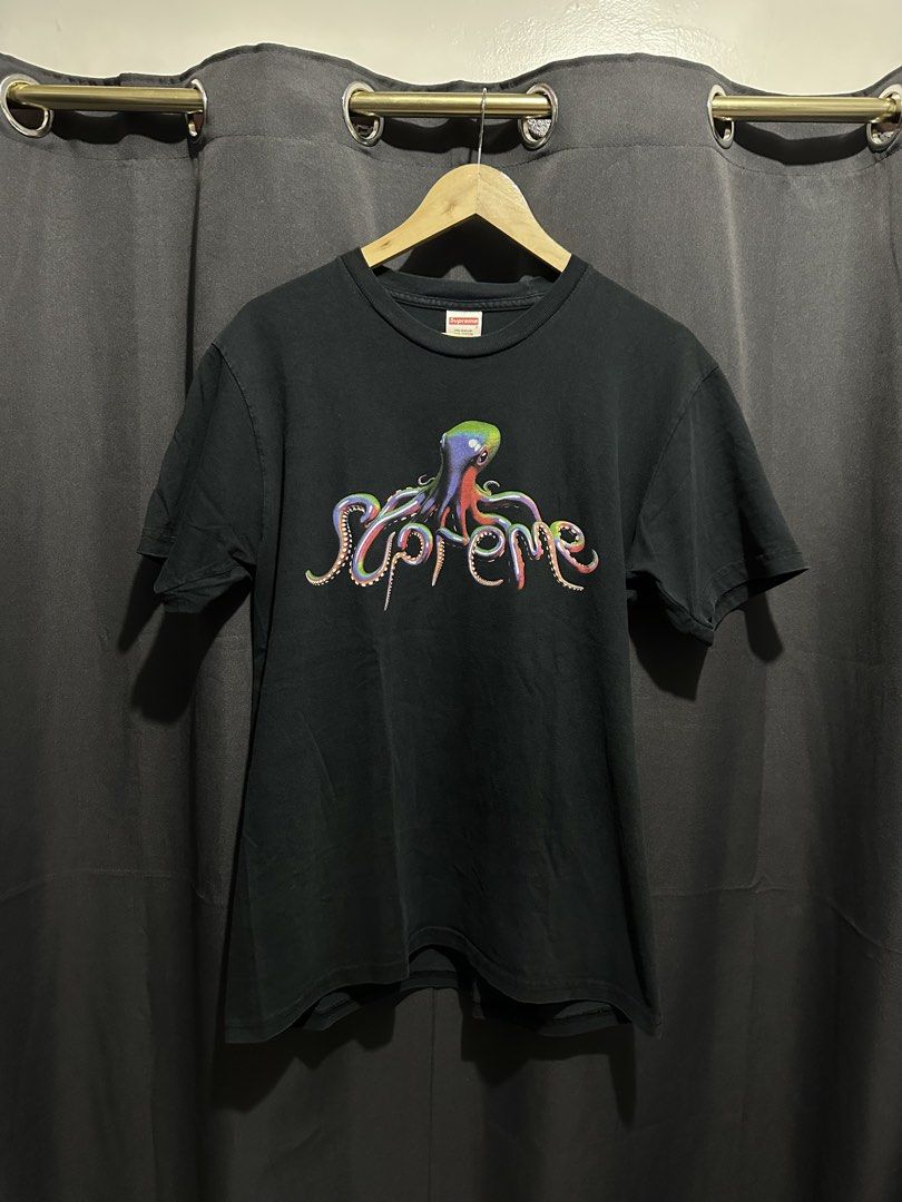 Supreme Octopus Graphic Tee (Category: Tshirts & Polo Shirts ) located in Buenavista. Submitted by themodernrack (Listing ID 1470592359, Image 1). Description: Condition: Good condition, minimal hairlines Measurements & Sizing: Size: Tagged Size M Width (Pit to Pit): 20” Length: 27”.
