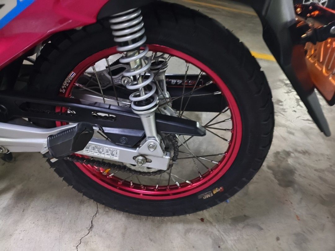 Suzuki Motorcycle Pink (Category: Motorbikes for Sale) located in Pasay City. Submitted by vinodeclutterph (Listing ID 1470728884, Image 2). Description: For Sale: Legendary Smash 115 50k asking fresh and equipped 23' model Drum type classic version Powerful stock engine never open low mileage garage king service only project bike aka Manila concept big chunky tires sawali rios heavy duty set up for long rides top box available free bracket Immac
