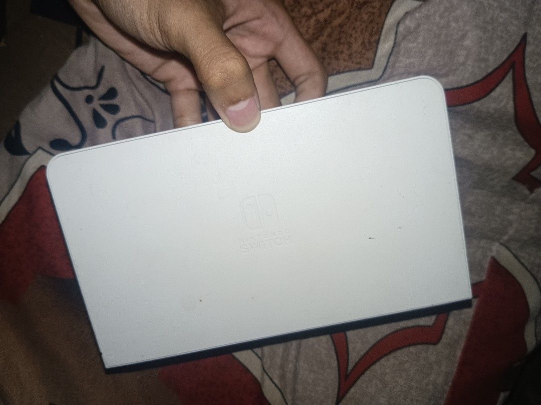 Switch accessories as is but working (Category: Controllers) located in Mandaluyong City. Submitted by console06 (Listing ID 1470726456, Image 2). Description: Switch accessories as is Dock oled no cover blink siya kapag inoopen kayo na bahala-300 pesos Cooling fan for switch dock no issue-250 Switch controller with light issue left controller not working -400 Location: Mandaluyong open meet up or lalamove kapag malayo ok.