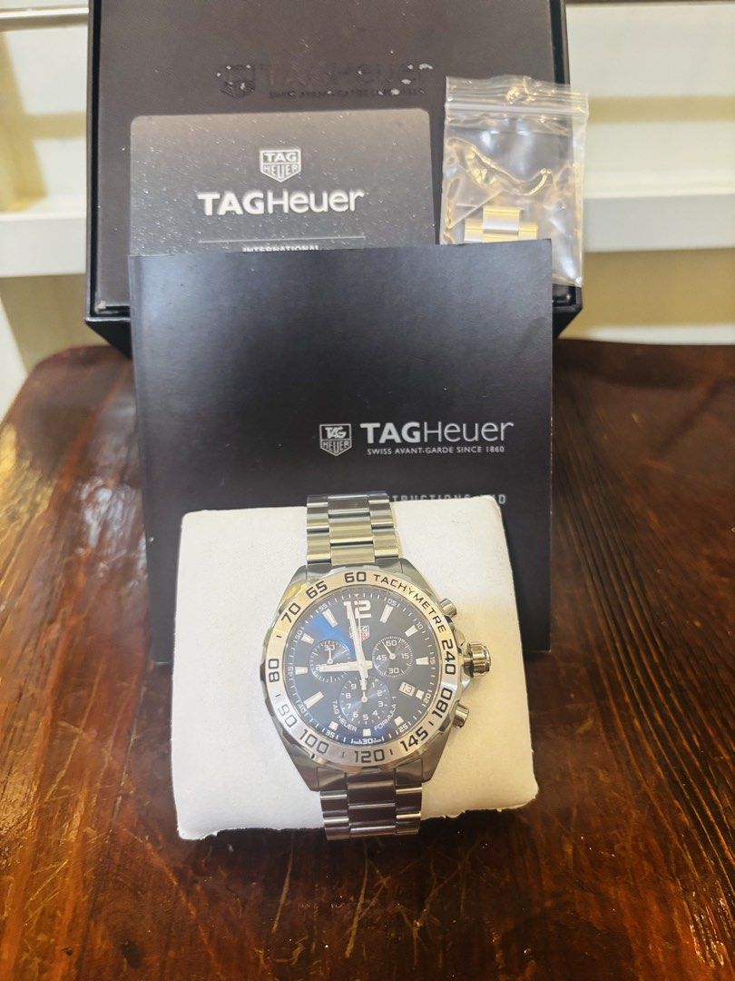 TAG Heuer FORMULA 1 CHRONOGRAPH (Category: Men's Watches) located in Bacoor. Submitted by cathya_081314 (Listing ID 1470622889, Image 3). Description: Use twice only Bought in Four Season Tag Heuer Shop Macau With complete inclusions line authenticity card and box Quartz, 43 mm, Steel CAZ101K.BA0842 A chronograph with blue sunray-brushed dial and 3-row steel bracelet. Quartz powered for ultimate precision and water resistant to 200 meters. Ready 