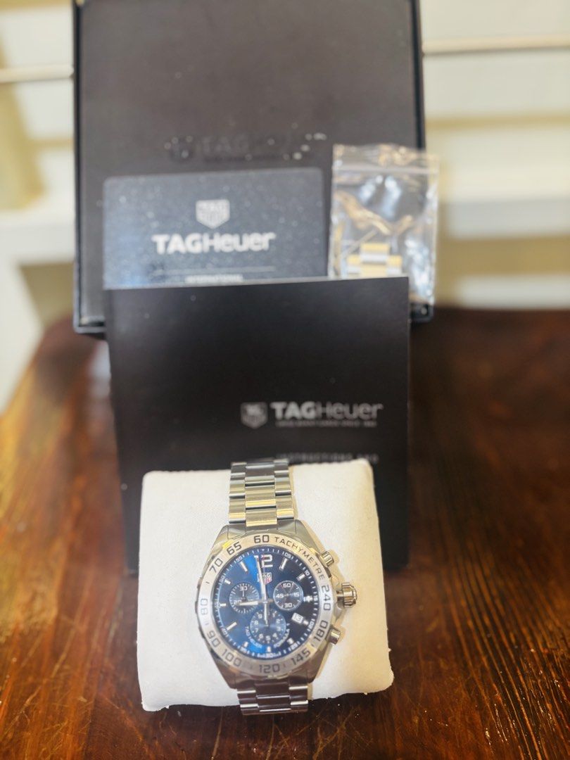 TAG Heuer FORMULA 1 CHRONOGRAPH (Category: Men's Watches) located in Bacoor. Submitted by cathya_081314 (Listing ID 1470622889, Image 2). Description: Use twice only Bought in Four Season Tag Heuer Shop Macau With complete inclusions line authenticity card and box Quartz, 43 mm, Steel CAZ101K.BA0842 A chronograph with blue sunray-brushed dial and 3-row steel bracelet. Quartz powered for ultimate precision and water resistant to 200 meters. Ready 