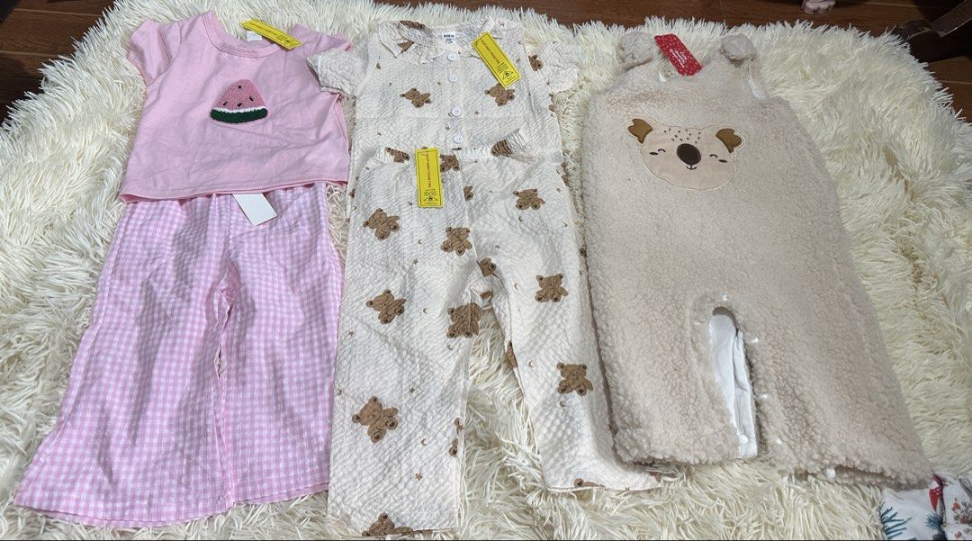 Take all 1000 (Category: Babies & Kids Fashion) located in Caloocan City. Submitted by aizabalan52674 (Listing ID 1470601041, Image 2). Description: - Adorable baby girl clothes bundle featuring multiple cute styles - Includes: Christmas outfit with shoes, watermelon top with gingham pants, teddy bear pajama set, fluffy koala jumpsuit, and floral romper with matching headband - Multiple pieces still have tags attached (BNWT) - Made with soft, com