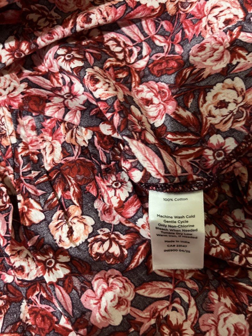 Talbots Petite Floral Ruffle Blouse Size P (Category: Blouses) located in Balanga. Submitted by clscloset.621 (Listing ID 1470682942, Image 3). Description: - Brand: Talbots Petite - Design: Rich burgundy and pink floral print with V-neckline, ruffled collar, and front pintuck pleats - Sleeves: Long sleeves with charming ruffled cuffs - Material: 100% premium cotton (soft, breathable, and comfortable) - Care: Machine washable on a gentle cycle - 