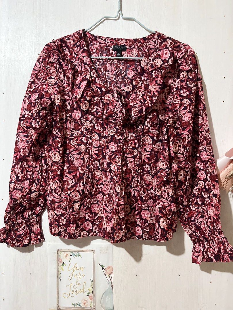 Talbots Petite Floral Ruffle Blouse Size P (Category: Blouses) located in Balanga. Submitted by clscloset.621 (Listing ID 1470682942, Image 1). Description: - Brand: Talbots Petite - Design: Rich burgundy and pink floral print with V-neckline, ruffled collar, and front pintuck pleats - Sleeves: Long sleeves with charming ruffled cuffs - Material: 100% premium cotton (soft, breathable, and comfortable) - Care: Machine washable on a gentle cycle - 