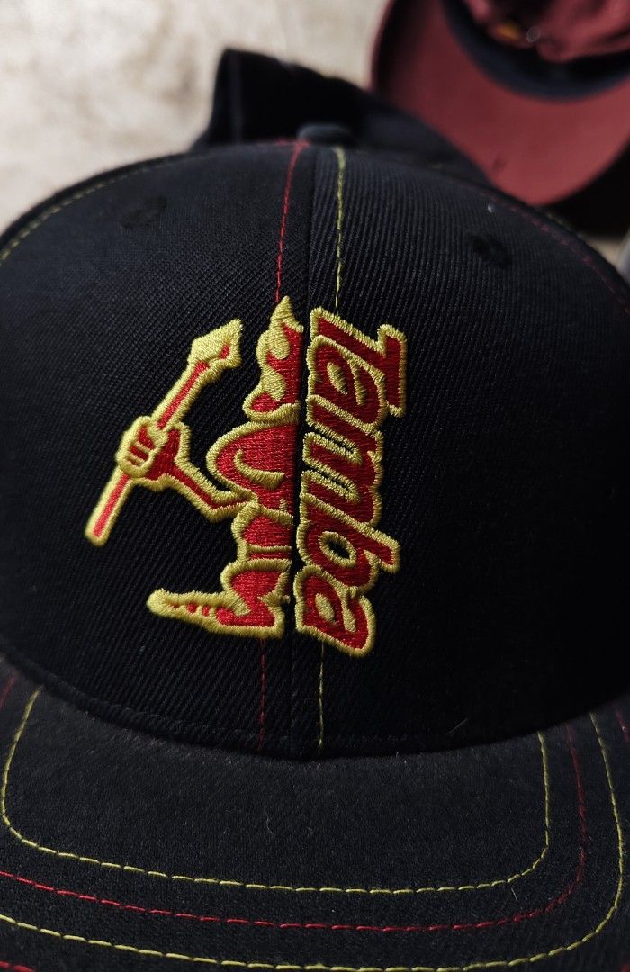 Tamba Surf Co Kauai Snapback Hat (Category: Caps & Hats) located in Quezon City. Submitted by truedeer_cda94c (Listing ID 1470605291, Image 1). Description: - Brand: Tamba Surf Co Kauai - Style: Black snapback hat with red plastic closure - Design: Eye-catching red and yellow embroidery on front and back - Material: Premium acrylic, wool, and PU spandex blend - Condition: Clean structure with solid stitching.