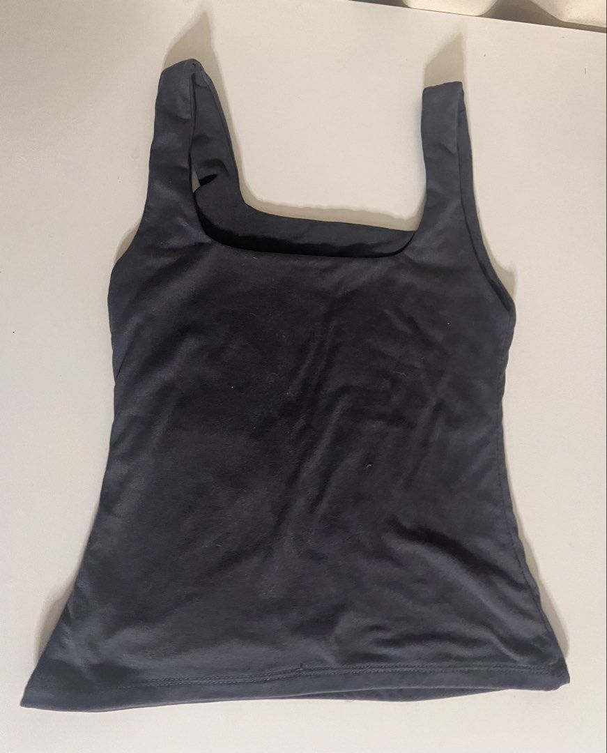 tank top slim fitting womenswear soft plain basic fabric spandex - get all 3 (Category: Sleeveless) located in Muntinlupa City. Submitted by remshop (Listing ID 1470707252, Image 2). Description: take all 3 for php 165 black tank - local nightmarket blue tank - from mera (i think) gray tank - from michi brand size: stretchable kaya s-m used once or twice but not really my style/aesthetic.