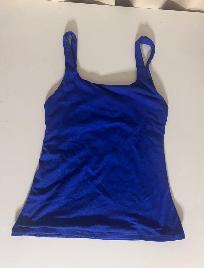 tank top slim fitting womenswear soft plain basic fabric spandex - get all 3 (Category: Sleeveless) located in Muntinlupa City. Submitted by remshop (Listing ID 1470707252, Image 3). Description: take all 3 for php 165 black tank - local nightmarket blue tank - from mera (i think) gray tank - from michi brand size: stretchable kaya s-m used once or twice but not really my style/aesthetic.