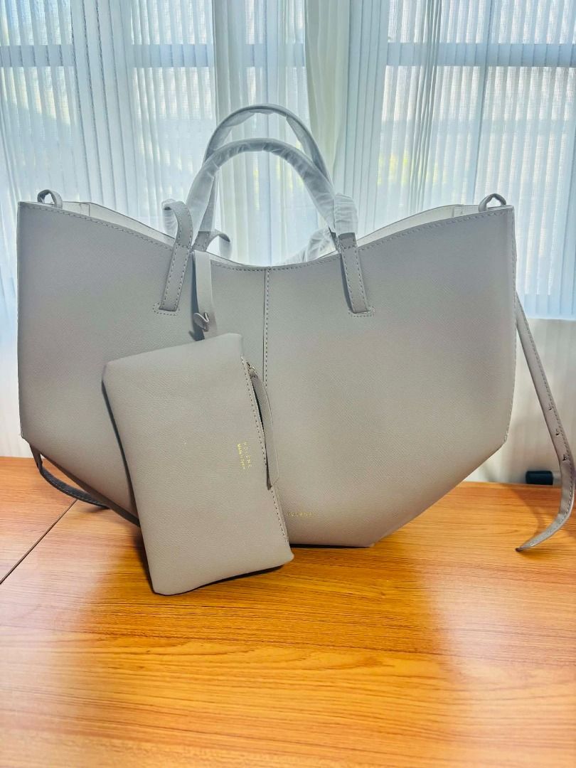 Taupe Tote Bag with Drawstring Sides (Category: Tote Bags) located in Cabanatuan. Submitted by sierra12 (Listing ID 1470681635, Image 2). Description: Stone gray color | Regular size brandnew from Thailand | no box | w/ dustbag.