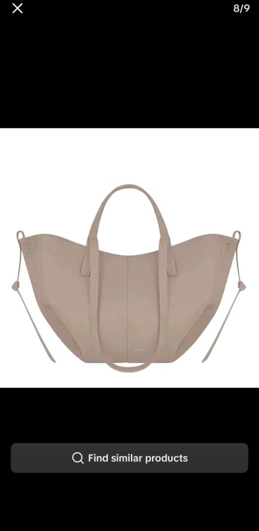 Taupe Tote Bag with Drawstring Sides (Category: Tote Bags) located in Cabanatuan. Submitted by sierra12 (Listing ID 1470681635, Image 1). Description: Stone gray color | Regular size brandnew from Thailand | no box | w/ dustbag.