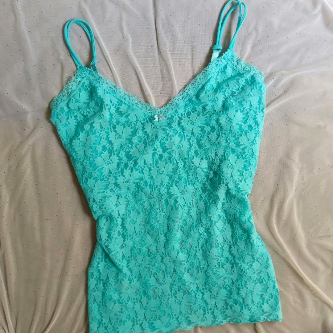 Teal Lace Camisole Tank Top (Category: Sleeveless) located in Manila. Submitted by electricpetals (Listing ID 1470704341, Image 3). Description: - Size: M-XL - Color: Teal/Bubblegum Blue - Straps: Adjustable thin straps for a custom fit - Detail: Cute small bow at the center bust - perfect for layering or wearing on its own - Condition: Excellent .