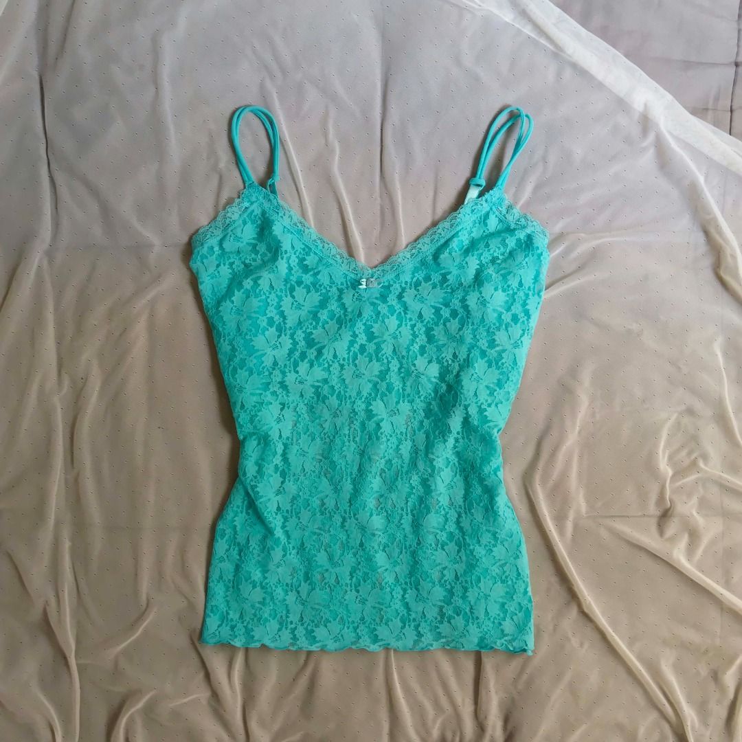 Teal Lace Camisole Tank Top (Category: Sleeveless) located in Manila. Submitted by electricpetals (Listing ID 1470704341, Image 1). Description: - Size: M-XL - Color: Teal/Bubblegum Blue - Straps: Adjustable thin straps for a custom fit - Detail: Cute small bow at the center bust - perfect for layering or wearing on its own - Condition: Excellent .