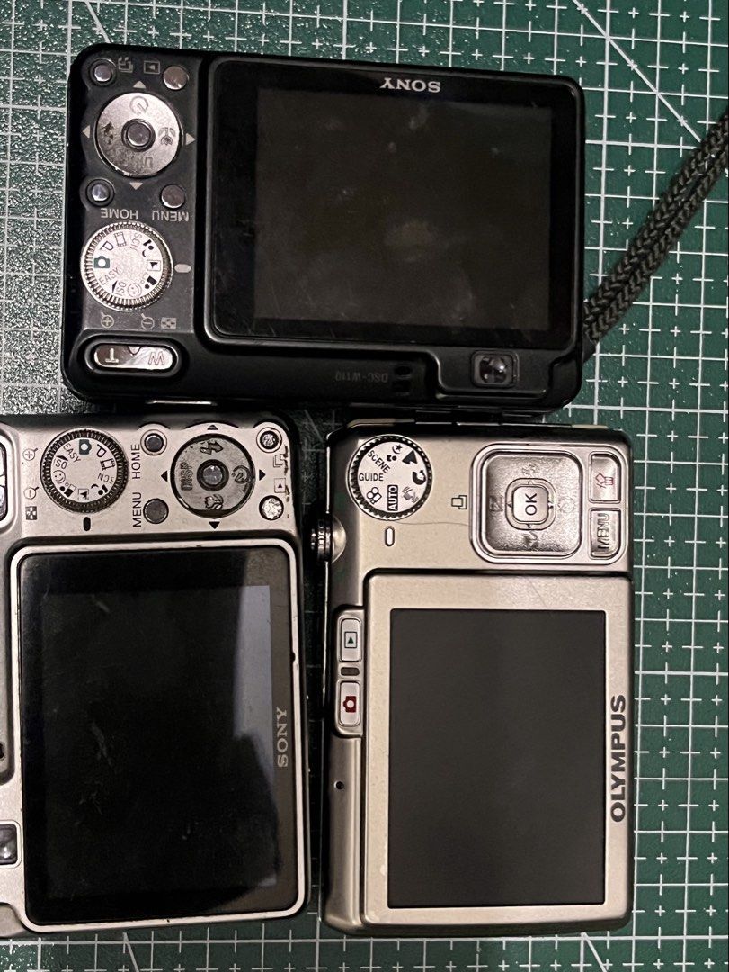 TESTED & UNTESTED DIGICAM [SONY & OLYMPUS] (Category: Cameras) located in Pasig City. Submitted by xoxoyours (Listing ID 1470629760, Image 2). Description: Can be sold as bundle [950 if bundle] OLYMPUS [UNTESTED] -i have no battery to test body cosmetics 9/10 ang kinis pa Both Sony Dscw110 are working can be use for parts or pagpalitin nyo parts nilang dalawa issue: the black one is lens stuck and some screws are missing na:( silver naman is blac