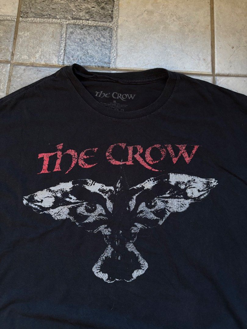 The Crow “Crow Eyed Logo” Tee (Category: Tshirts & Polo Shirts ) located in Calamba. Submitted by manila.fits (Listing ID 1470641001, Image 2). Description: The Crow “Crow Eyed Logo” Tee XL Width 23.5 Length 28 In pristine condition .
