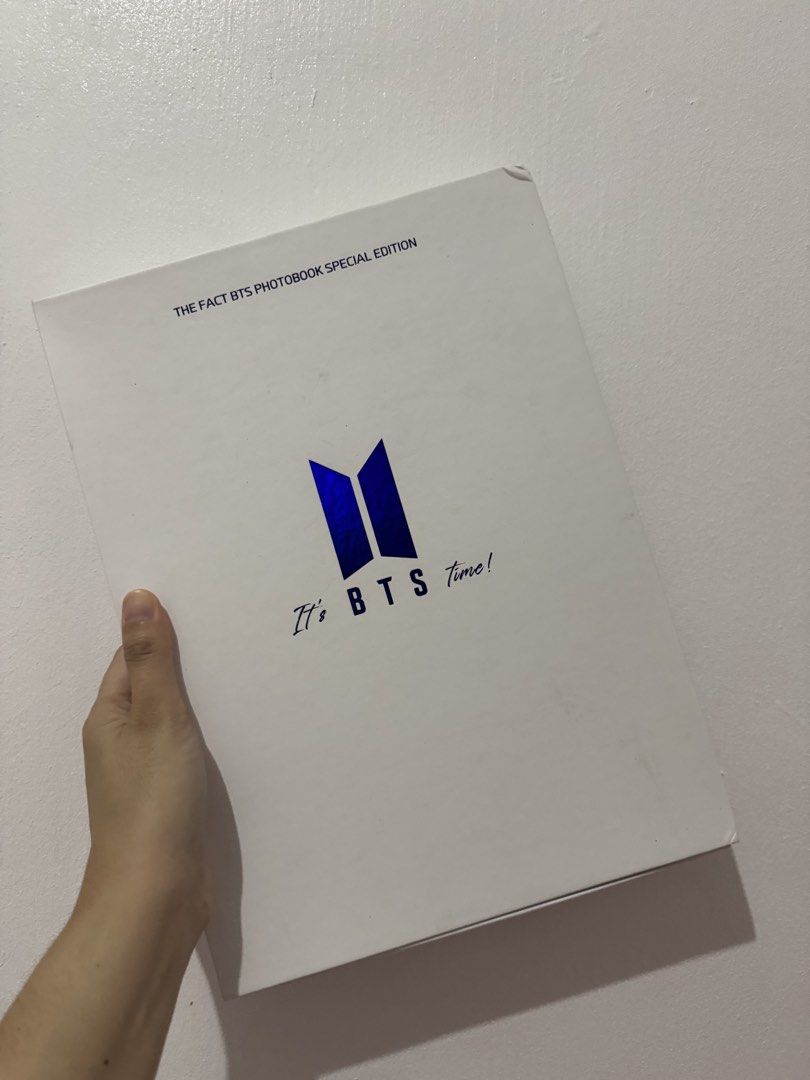 The Fact BTS Photobook Special Edition We Remember (Category: K-Wave Merchandise) located in Manila. Submitted by babybear8 (Listing ID 1470676622, Image 1). Description: - Official BTS We Remember Special Edition Photobook (The Fact Music Awards 2020) - White outer box with a stylish metallic blue logo - Includes main photobook, and all original inserts - Perfect addition to any ARMY collection.
