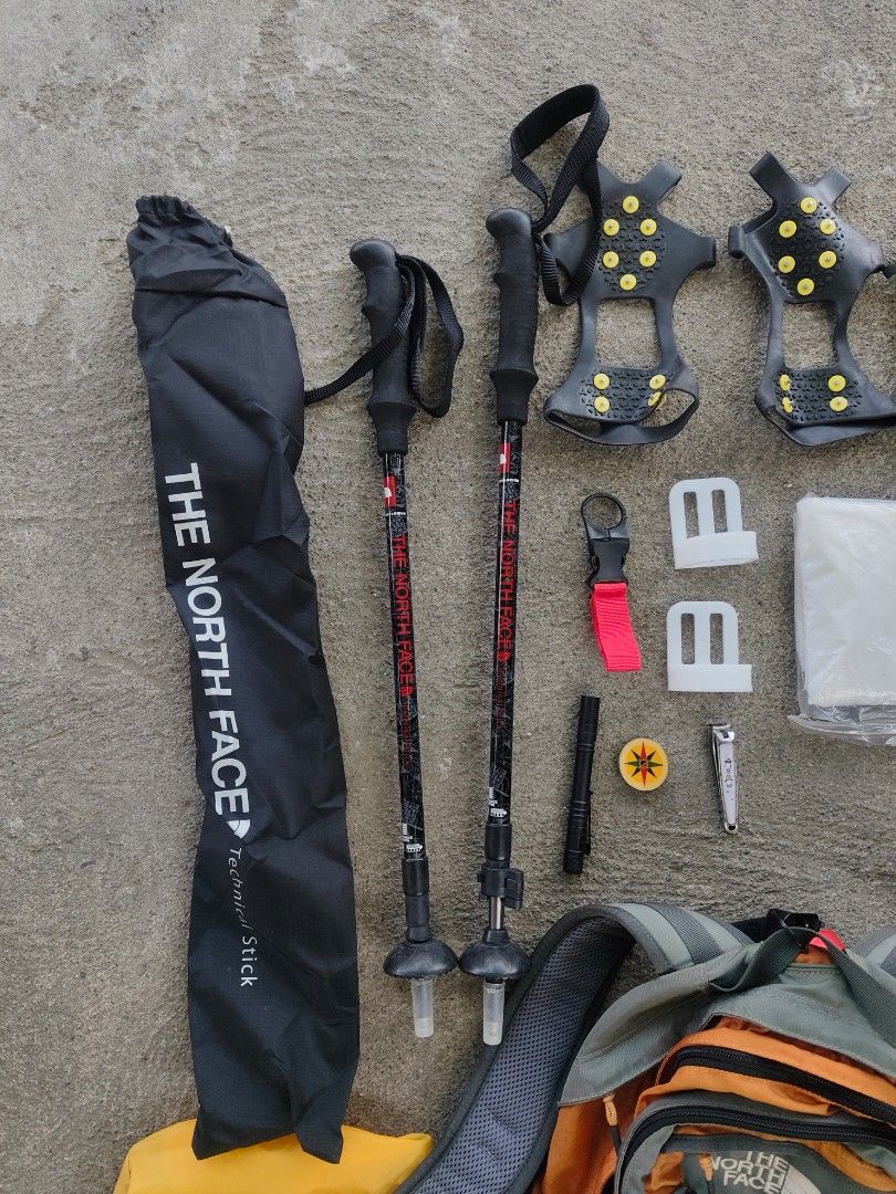 The North Face Electron 26 Hiking Backpack Gear Bundle (Category: Backpacks) located in Manila. Submitted by joshespino71762 (Listing ID 1470609949, Image 3). Description: - Brand: The North Face - Model: Electron 26 Backpack (Grey and Orange) - Includes high-visibility yellow rain cover - Complete trekking gear set: trekking poles with carry bag, crampons, and protective gloves - Utility accessories: utility pouch, hammer, and arm sleeves includ